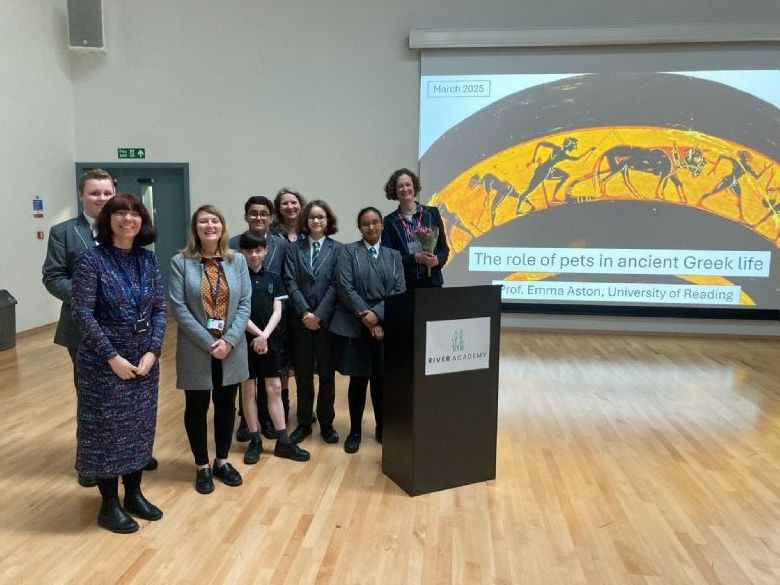 Students photographed with Professor Emma Aston